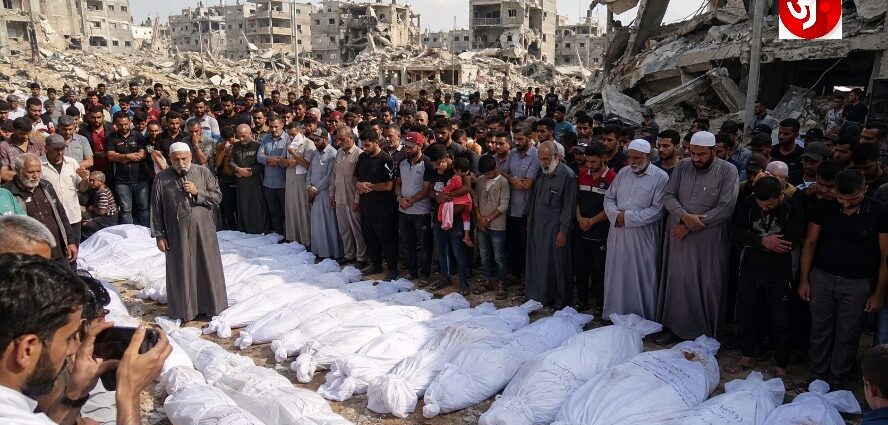 112 LAID TO REST IN GAZA: A MASS FUNERAL NEARLY THREE YEARS AFTER THEIR FAMILIES WERE BURIED BENEATH