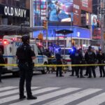 TIMES SQUARE HORROR: BANK OF AMERICA VP STABBED TO DEATH IN BROAD DAYLIGHT; POLICE SHOOT ATTACKER